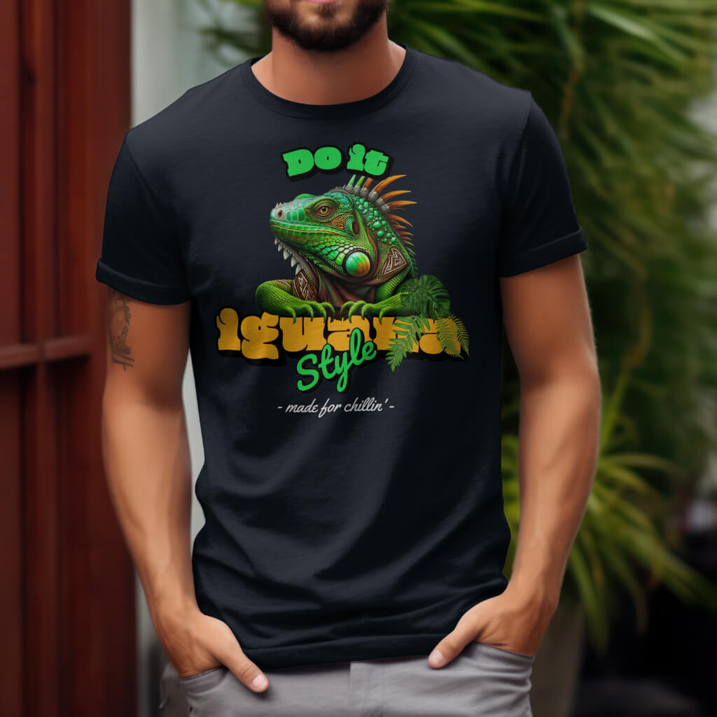 Zwart T-shirt met een illustratie van een leguaan en de tekst 'Do It Iguana Style', voor liefhebbers van een relaxte levensstijl.